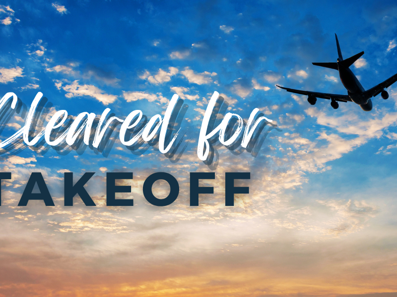 A blue sky with clouds and a passenger jet next to text that reads Cleared for Takeoff.